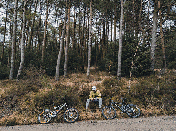 mountain biker with two bikes