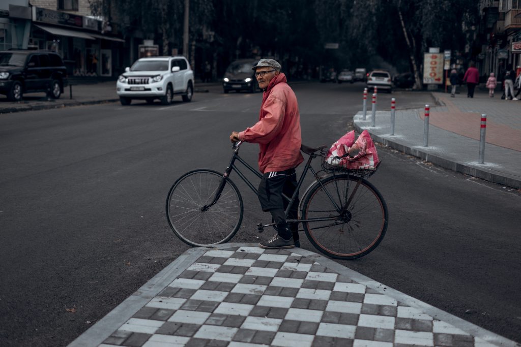 man stopping for traffic