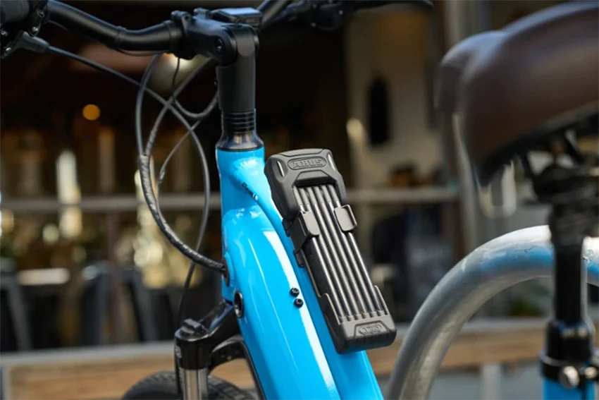 folding bike lock on a blue bike