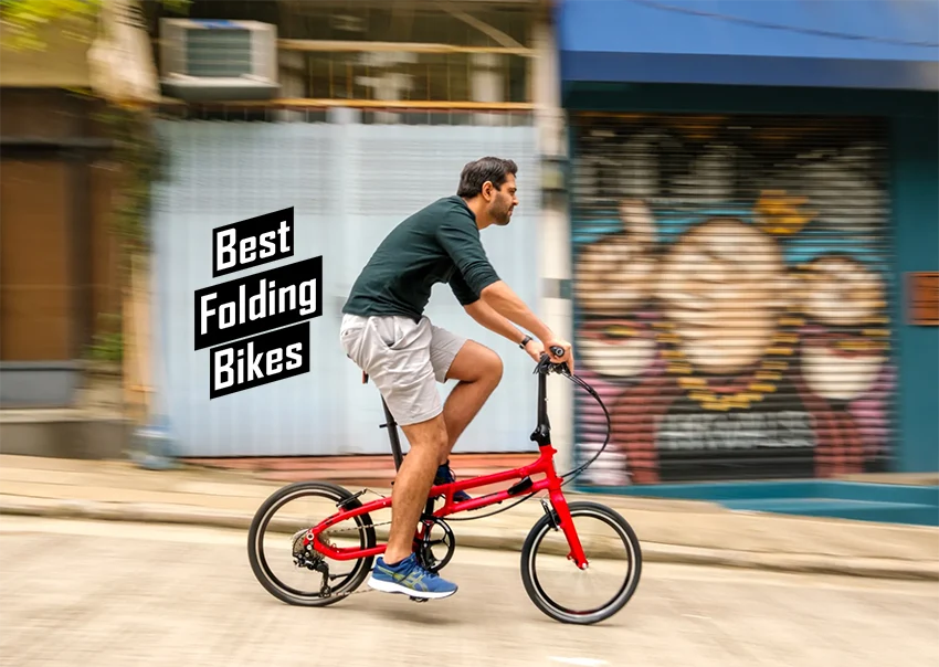 man riding red tern folding bike