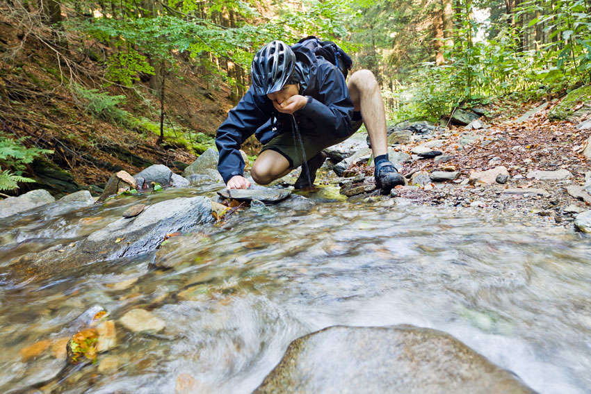 mountain biker drinking water