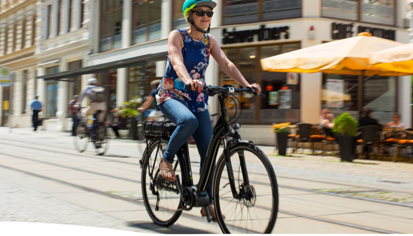 woman riding a breezer electric bike