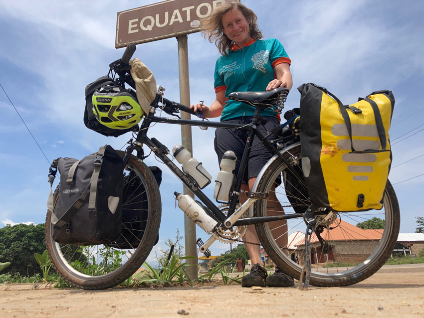 Eilidh with bike in Africa