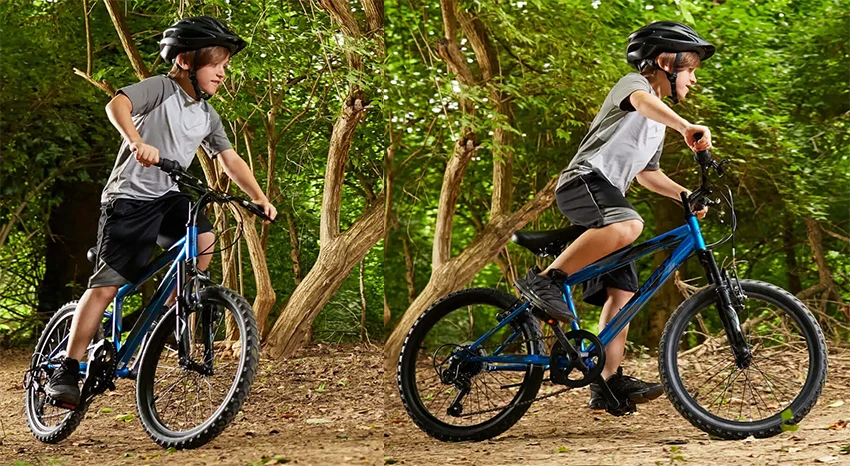 boy riding a kids huffy mountain bike in the forest